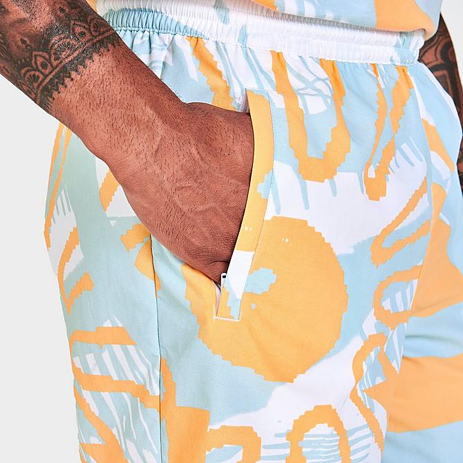 On Model 6 view of Men's adidas Originals Adiplay Allover Print Shorts in Sky Tint/Acid Orange Click to zoom