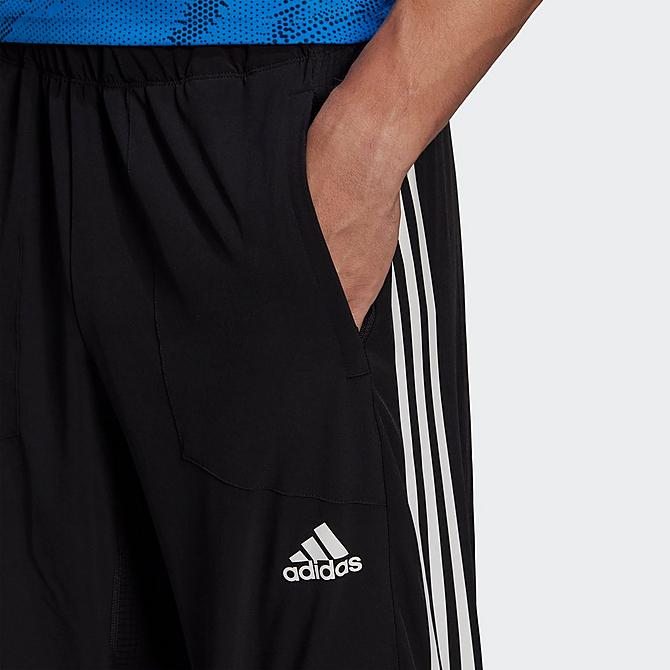 On Model 5 view of Men's adidas Train Icons Training Jogger Pants in Black Click to zoom