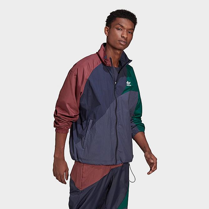 Front Three Quarter view of Men's adidas Originals Adicolor Colorblock Track Jacket in Shadow Navy/Quiet Crimson/Collegiate Green Click to zoom