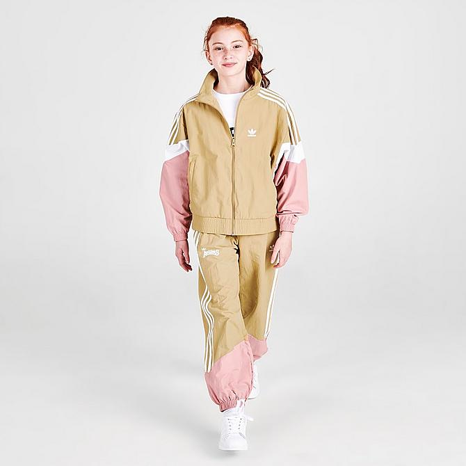Front Three Quarter view of Girls' adidas Originals Dance Woven Track Jacket in Khaki/White/Pink Click to zoom