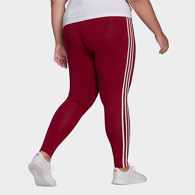 Front Three Quarter view of Women's adidas Essentials 3-Stripes Leggings (Plus Size) in Legacy Burgundy/White Click to zoom