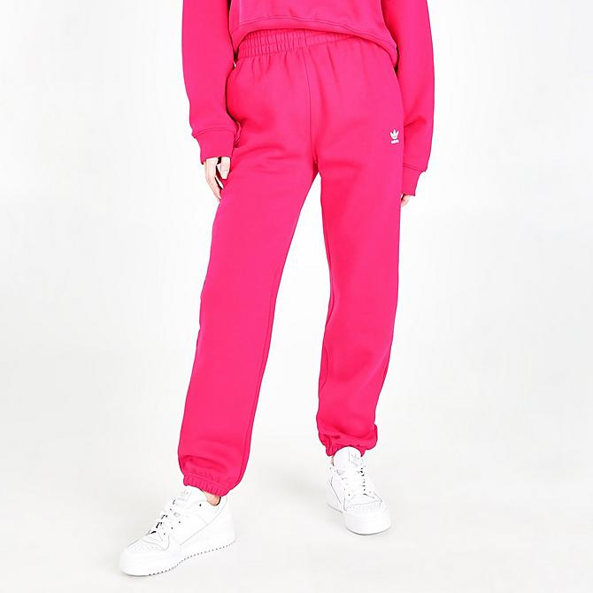 Front Three Quarter view of Women's adidas Originals Adicolor Essentials Fleece Jogger Pants in Bold Pink Click to zoom