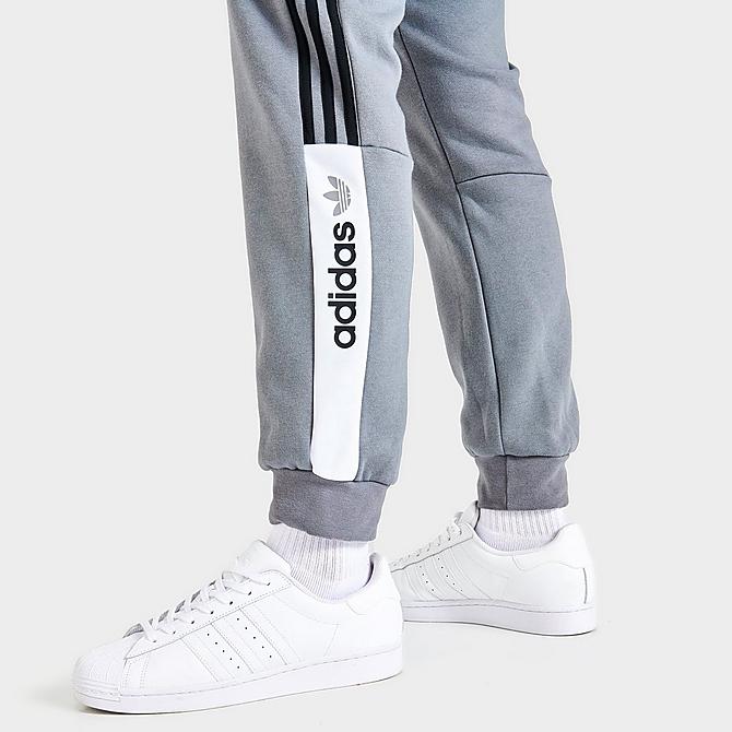 On Model 5 view of Men's adidas Nutasca Jogger Pants in Grey Click to zoom