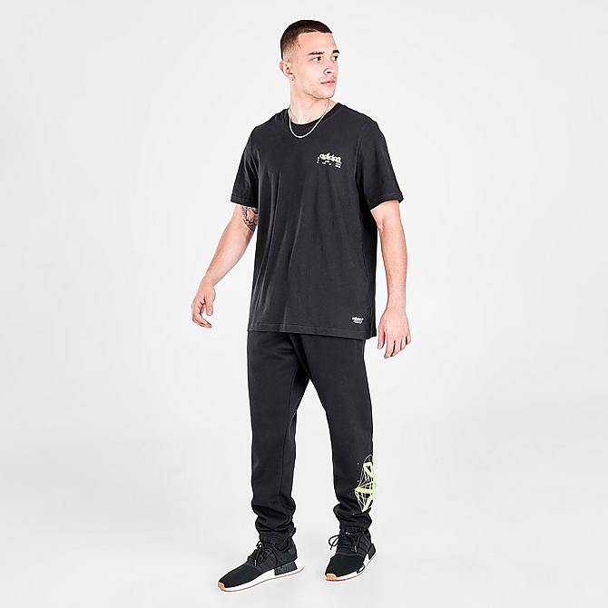 Front Three Quarter view of Men's adidas Originals Graphics Behind The Trefoil T-Shirt in Black/Solar Yellow Click to zoom
