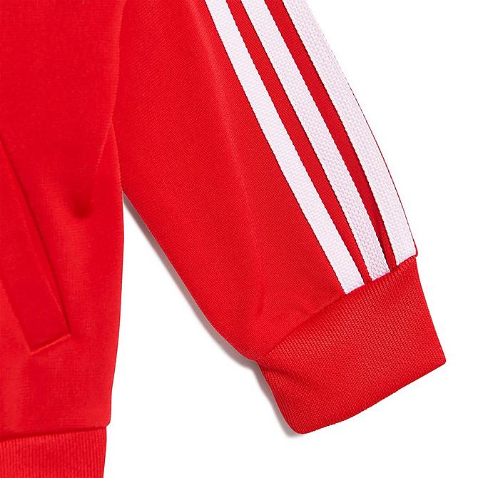 Front Three Quarter view of Infant and Kids' Toddler adidas Originals Adicolor SST Track Suit in Vivid Red/Cloud White Click to zoom