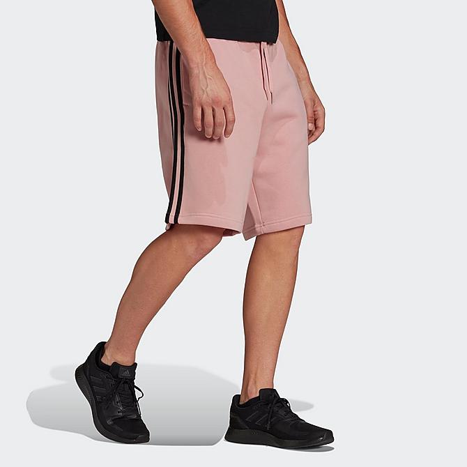 Back Left view of Men's adidas Essentials Three Stripes Shorts in Wonder Mauve/Black Click to zoom
