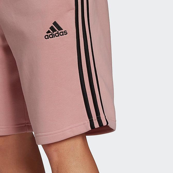 On Model 5 view of Men's adidas Essentials Three Stripes Shorts in Wonder Mauve/Black Click to zoom