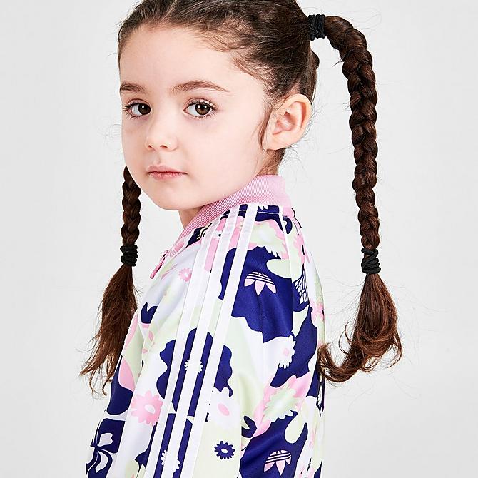 [angle] view of Girls' Infant and Toddler adidas Originals HER Studio London Floral Allover Print SST Track Jacket and Pants Set in White/True Pink/Almost Lime/Legacy Indigo Click to zoom