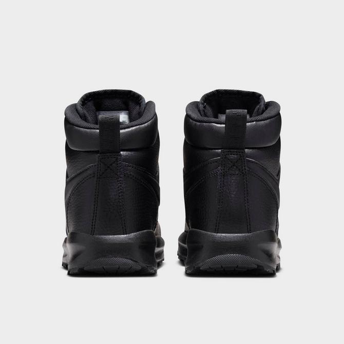 Left view of Little Kids' Nike Manoa Leather Boots in Black/Black/Black Click to zoom