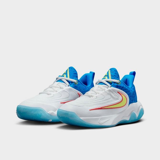 Three Quarter view of Big Kids' Nike Giannis Immortality 4 SE Basketball Shoes in White/Photo Blue/Hyper Royal/Light Lemon Twist Click to zoom