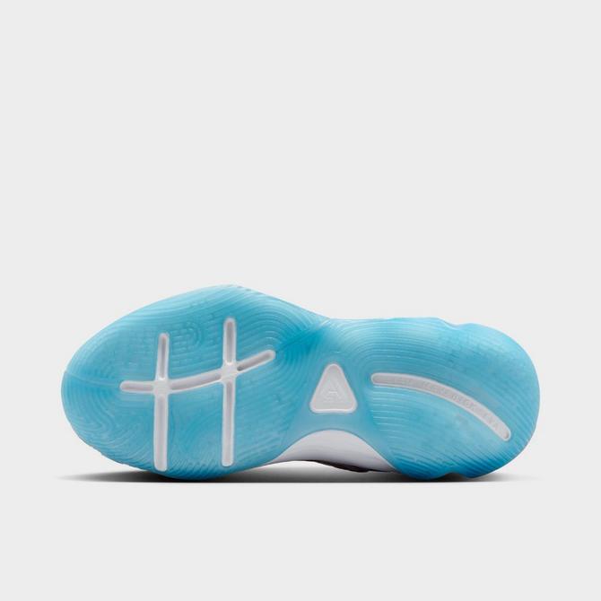 Bottom view of Big Kids' Nike Giannis Immortality 4 SE Basketball Shoes in White/Photo Blue/Hyper Royal/Light Lemon Twist Click to zoom