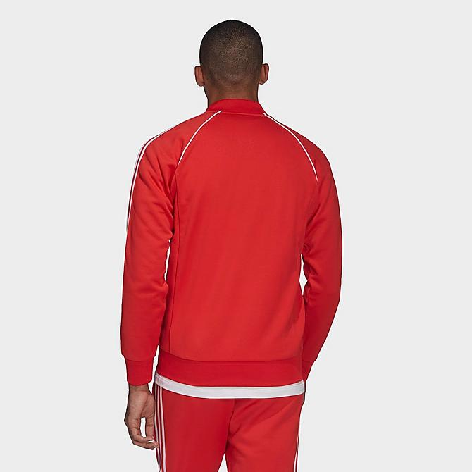 Front Three Quarter view of Men's adidas Originals Adicolor Primeblue SST Track Jacket in Vivid Red Click to zoom