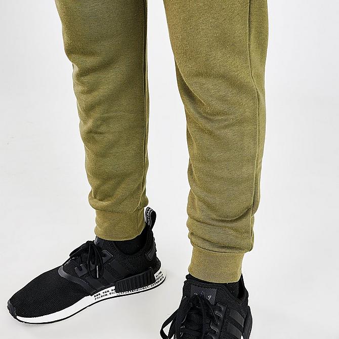 On Model 5 view of Kids' adidas Originals Essential Jogger Pants in Orbit Green Click to zoom