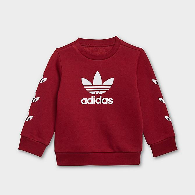 Front Three Quarter view of Kids' Infant and Toddler adidas Originals Repeat Trefoil Crewneck Sweatshirt and Jogger Pants Set in Collegiate Burgundy Click to zoom