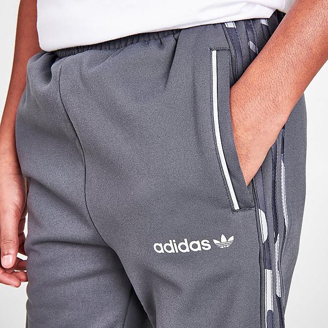On Model 5 view of Boys' adidas Originals Camo 3-Stripes Mix Material Jogger Pants in Grey/Camo Click to zoom