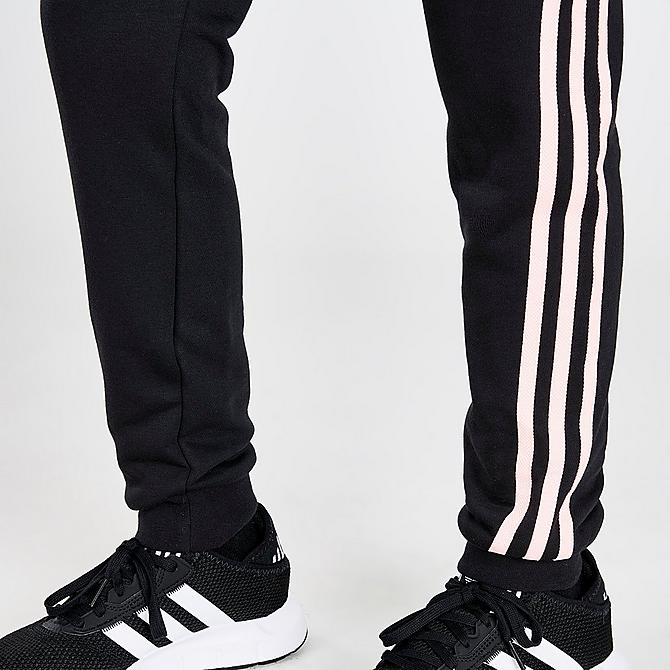 On Model 6 view of Girls' adidas Originals 3-Stripes Jogger Pants in Black/Pink Click to zoom