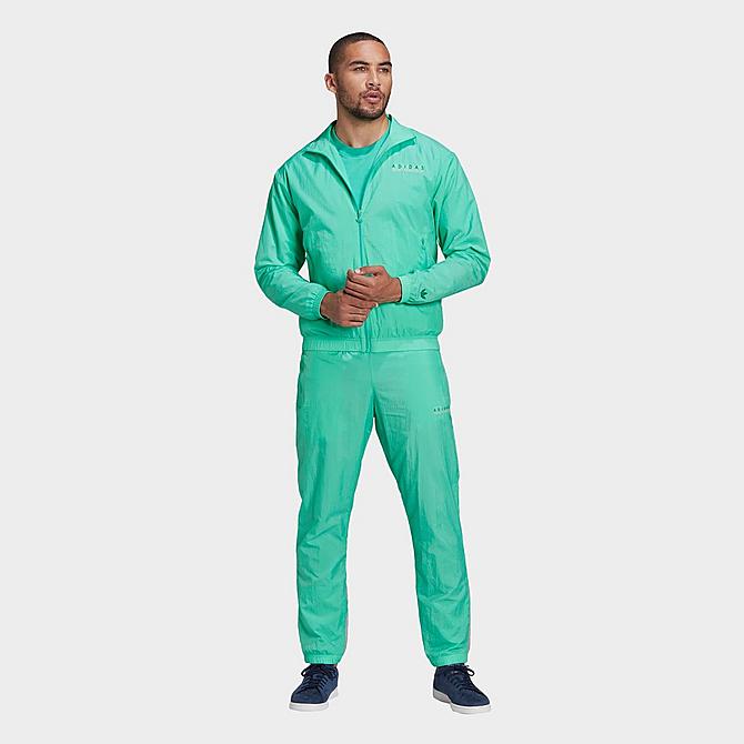 [angle] view of Men's adidas Originals Sports Club Tracksuit Pants in Green Click to zoom