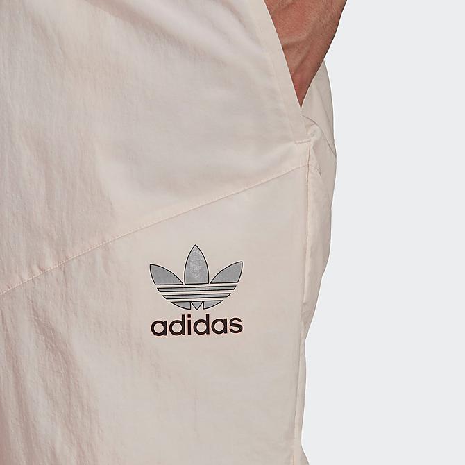 On Model 5 view of Men's adidas Originals 4D Cush Pants in Wonder White Click to zoom