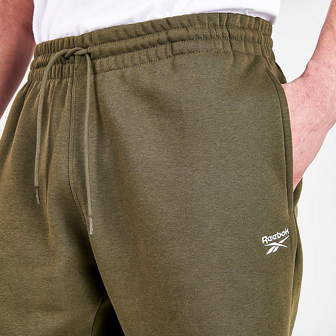 On Model 5 view of Men's Reebok Identity Training Shorts in Army Green Click to zoom