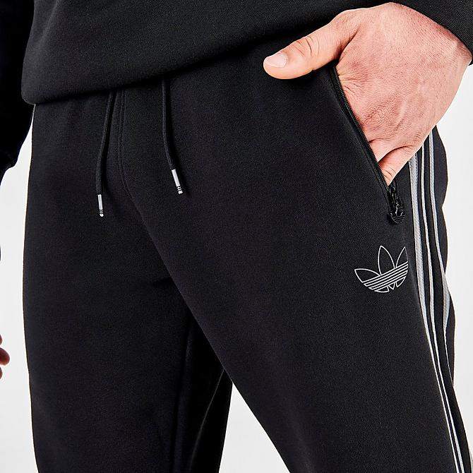 On Model 5 view of Men's adidas Originals Itasca 20 Jogger Pants in Black Click to zoom