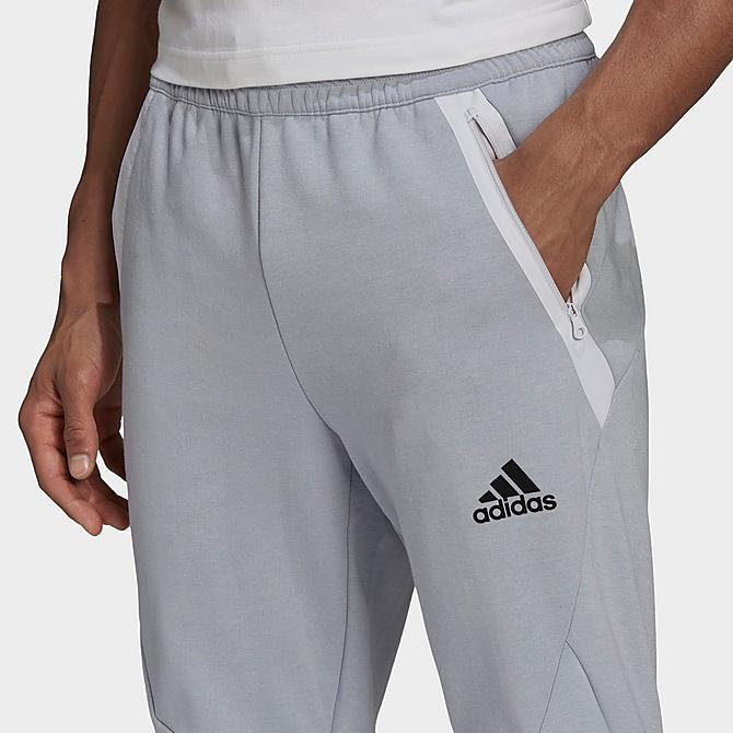 Back Right view of Men's adidas Essentials Designed For Gameday Jogger Pants in Halo Silver Click to zoom
