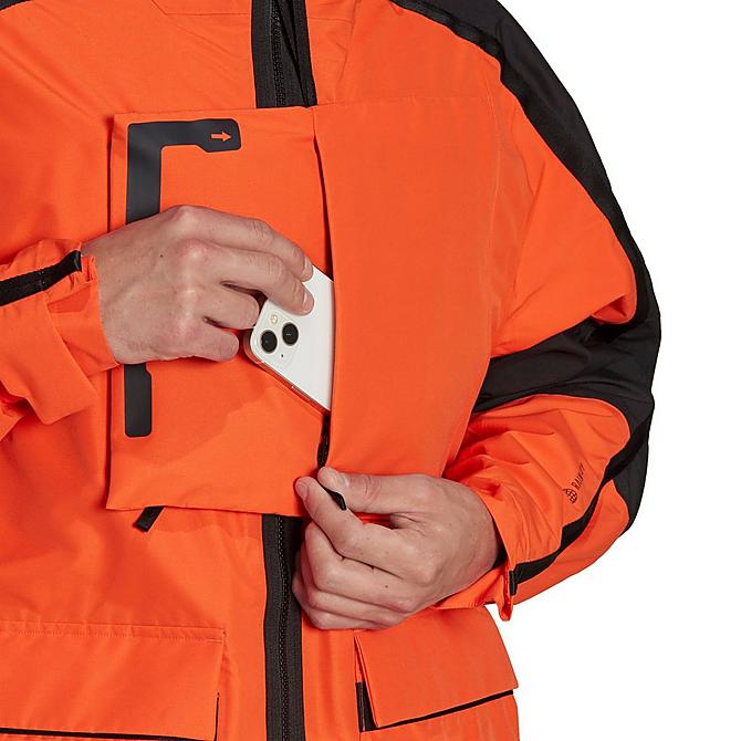 On Model 6 view of Men's adidas TERREX Xploric RAIN.RDY City Jacket in Semi Impact Orange/Black Click to zoom