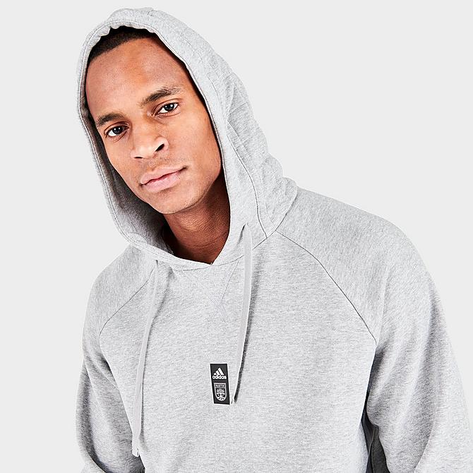 [angle] view of Men's adidas Austin FC Travel Pullover Hoodie in Medium Grey Click to zoom