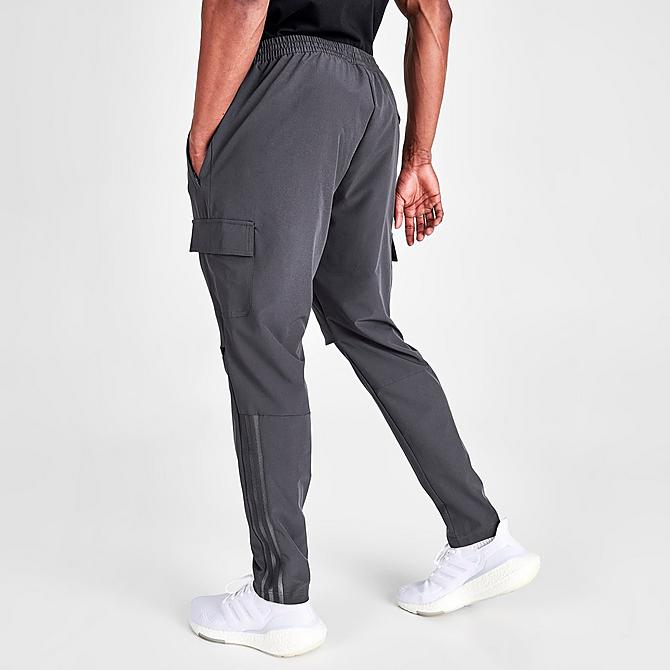 [angle] view of Men's adidas FC Cincinnati Soccer Cargo Travel Pants in Utility Black Click to zoom