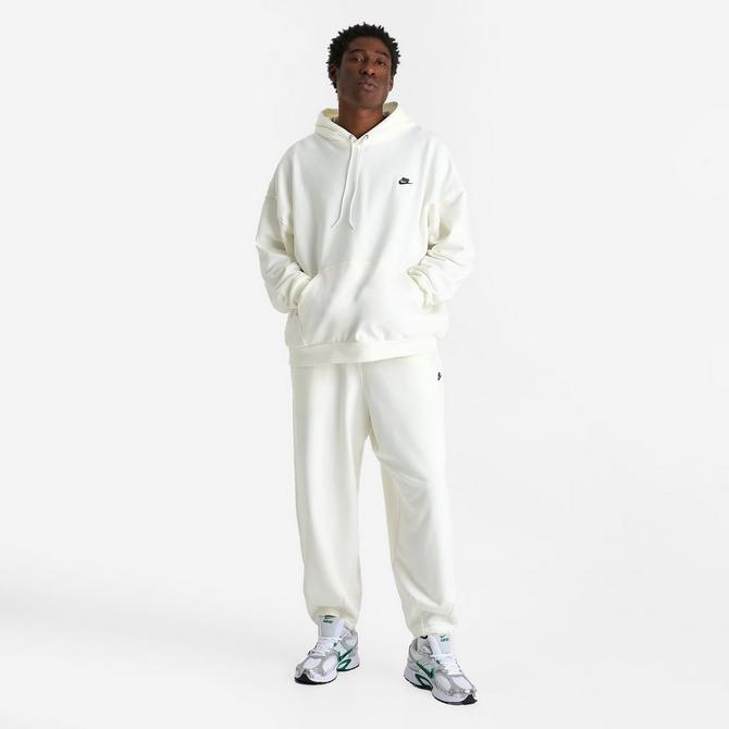 [angle] view of Men's Nike Club Fleece Oversized French Terry Pullover Hoodie in Sail/Sail/Black Click to zoom