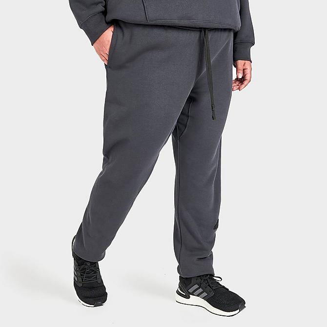 Back Left view of Women's adidas New Sportswear Logo Fleece Jogger Pants (Plus Size) in Carbon Click to zoom