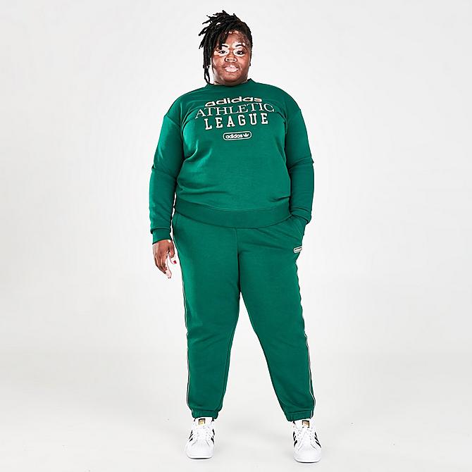 Front Three Quarter view of Women's adidas Originals Retro Luxury Crewneck Sweatshirt (Plus Size) in Collegiate Green Click to zoom