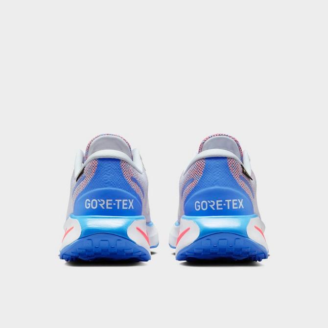 Left view of Women's Nike Motiva GORE-TEX Casual Shoes in Blue Tint/Blue Tint/University Blue/Bright Crimson Click to zoom