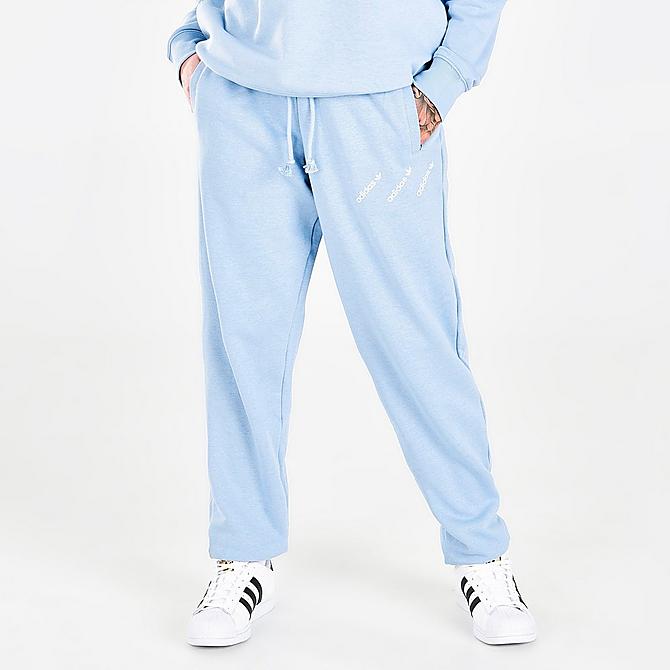Front Three Quarter view of Women's adidas Originals Triple Logo Track Pants in Ambient Sky Click to zoom