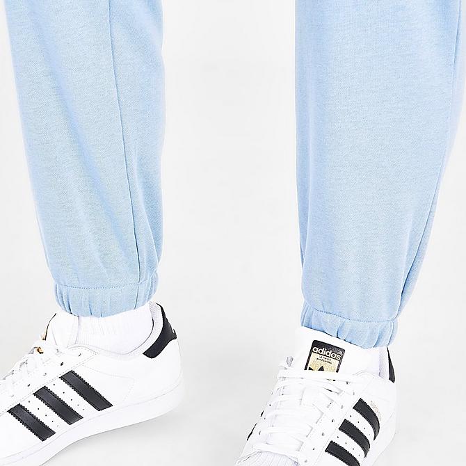 On Model 6 view of Women's adidas Originals Triple Logo Track Pants in Ambient Sky Click to zoom