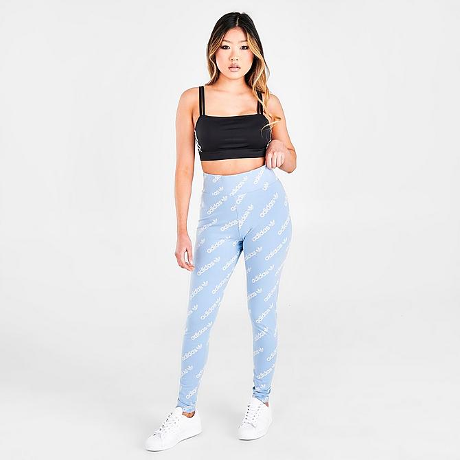 Front Three Quarter view of Women's adidas Originals Allover Logo Print Leggings in Ambient Sky Click to zoom
