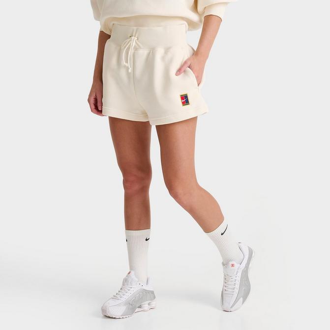 [angle] view of Women's NikeCourt Phoenix Fleece High-Waisted Loose Shorts in Pale Ivory Click to zoom