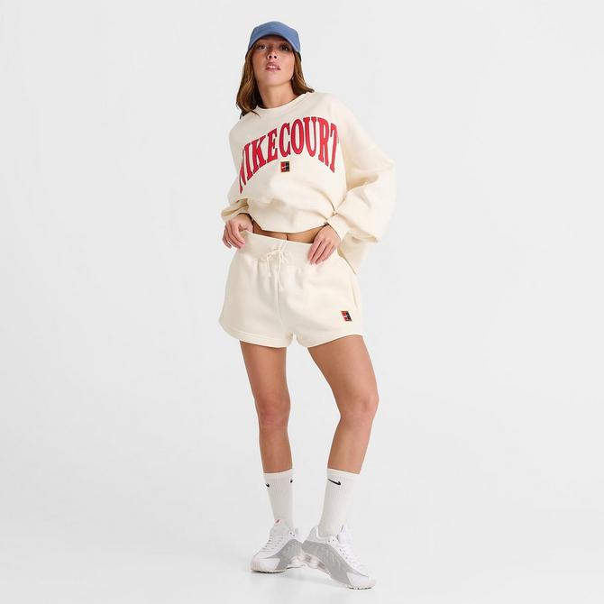 [angle] view of Women's NikeCourt Phoenix Fleece High-Waisted Loose Shorts in Pale Ivory Click to zoom