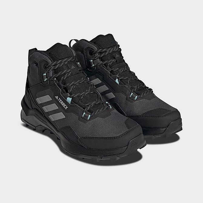 Three Quarter view of Women's adidas Terrex AX4 Mid GORE-TEX Hiking Shoes in Core Black/Grey Three/Mint Ton Click to zoom
