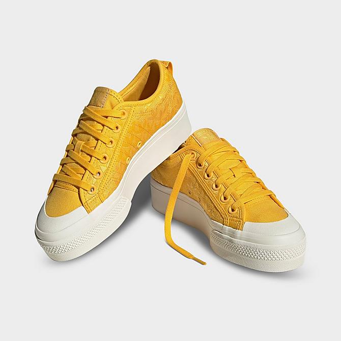 Three Quarter view of Women's adidas Originals Nizza Platform Casual Shoes in Bold Gold/Bold Gold/Off White Click to zoom