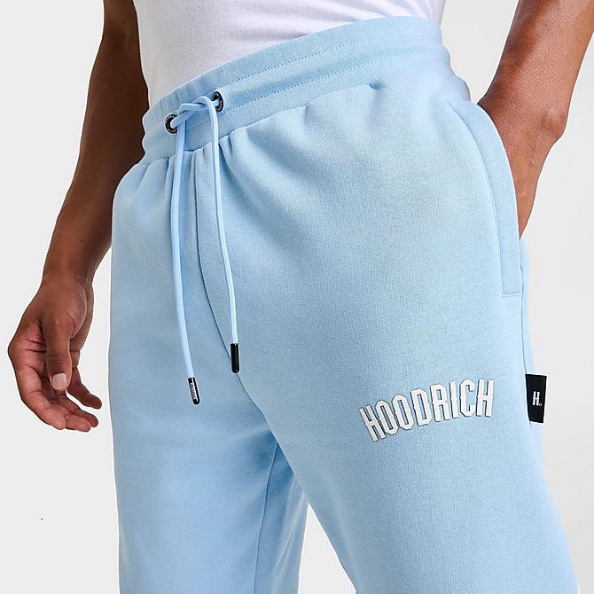 On Model 5 view of Men's Hoodrich OG Tycoon Jogger Pants in Clear Sky/White/Black Click to zoom