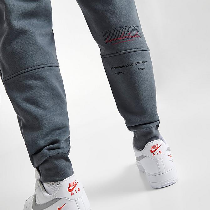 On Model 5 view of Men's Hoodrich OG Blend Graphic Print Jogger Pants in Grey/Black/Red Click to zoom