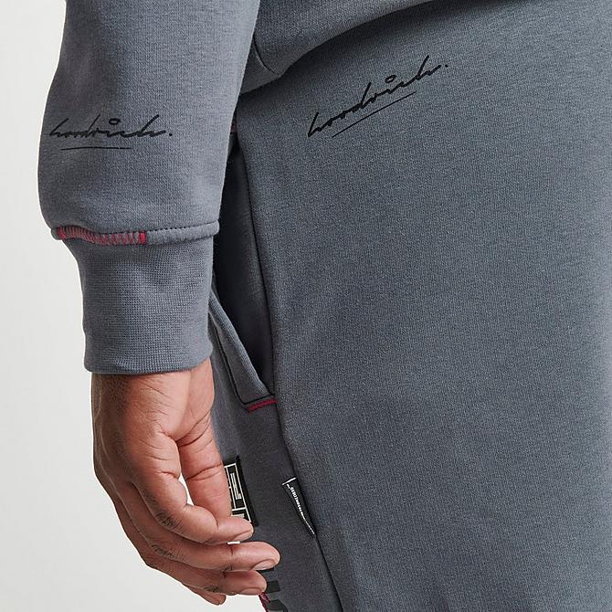 On Model 6 view of Men's Hoodrich OG Blend Graphic Print Jogger Pants in Grey/Black/Red Click to zoom