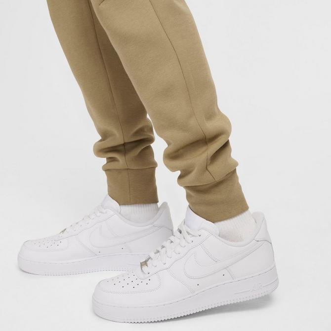 [angle] view of Men's Nike Tech Fleece Jogger Pants in Neutral Olive/Black Click to zoom