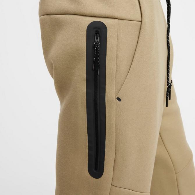 [angle] view of Men's Nike Tech Fleece Jogger Pants in Neutral Olive/Black Click to zoom