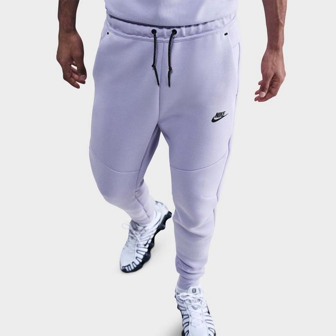 [angle] view of Men's Nike Tech Fleece Jogger Pants in Hydrangeas/Black Click to zoom