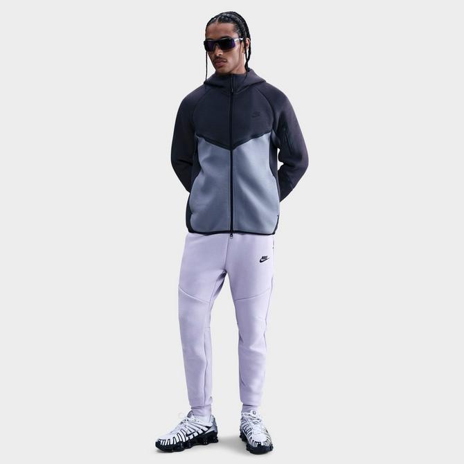 [angle] view of Men's Nike Tech Fleece Jogger Pants in Hydrangeas/Black Click to zoom
