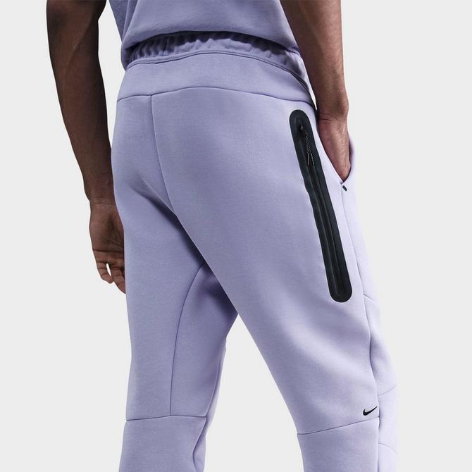 [angle] view of Men's Nike Tech Fleece Jogger Pants in Hydrangeas/Black Click to zoom