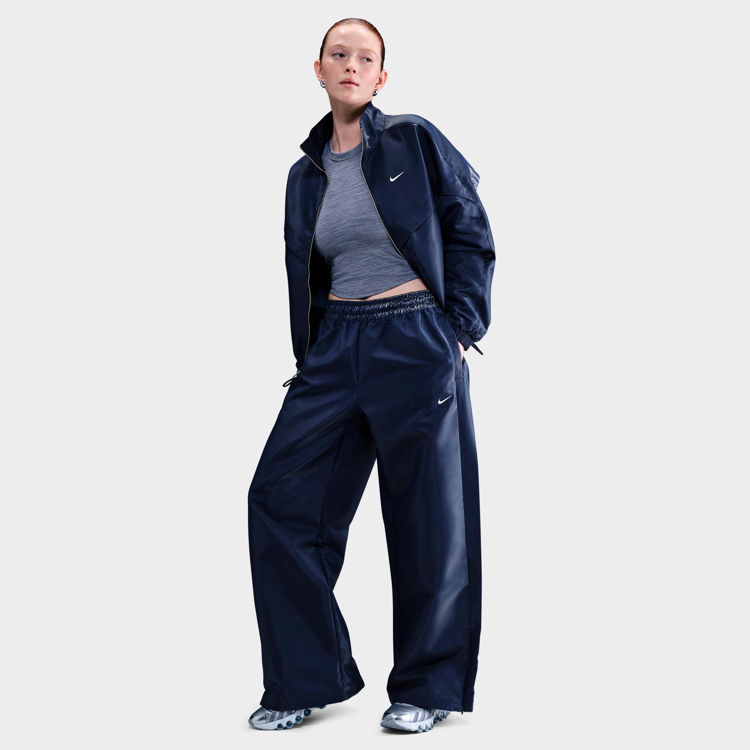 パンツ 2010s NIKE - knee stitching nylon pants Vintage Nike Nylon Track Pants Embroided Logo Swoosh Size М