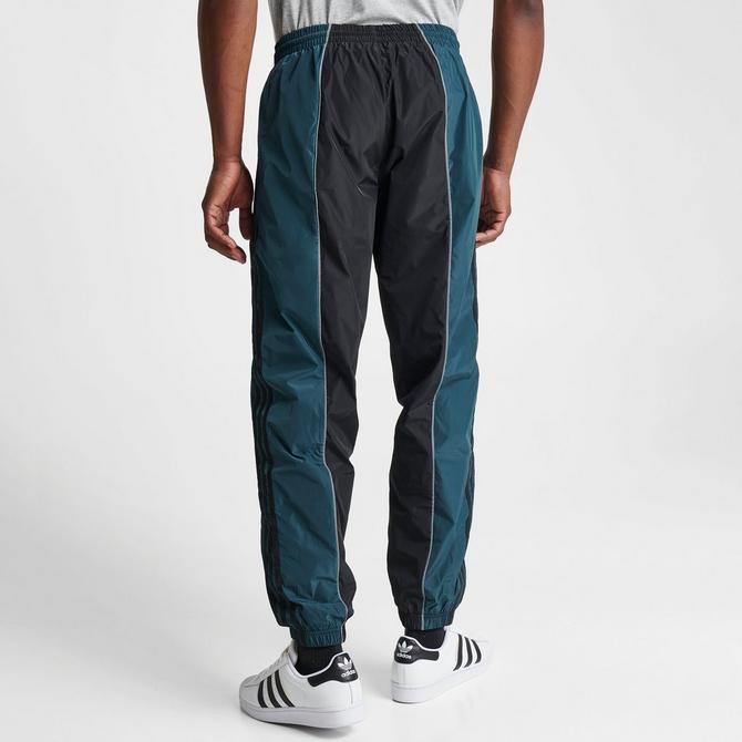 Men\'s adidas Originals Rekive Woven Finish Track Pants| Line