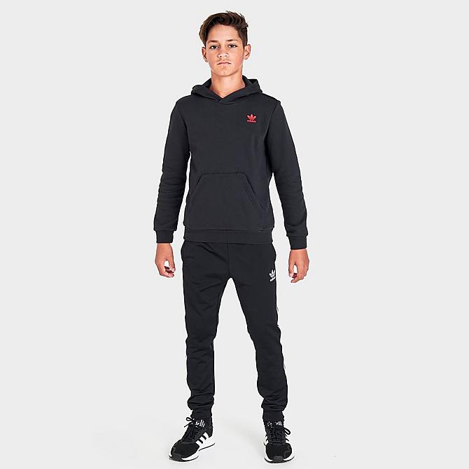 Front Three Quarter view of Kids' adidas Originals Trefoil Pullover Hoodie in Black/Red Click to zoom